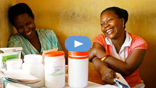 An Abundance of Pleasure Is Possible For All two women sitting laughing