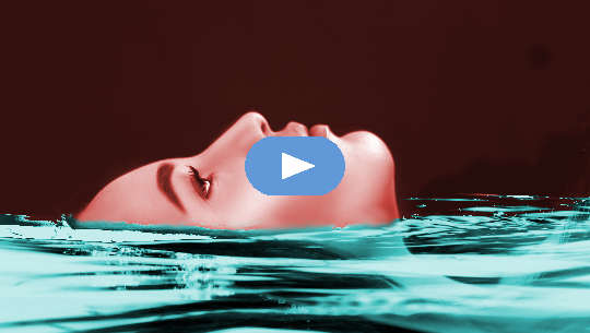 How To Develop Courage and Move Out of Your Comfort Zone face of woman floating in water