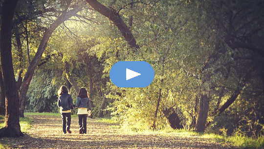 The Roads Both Taken two girls walking on a path