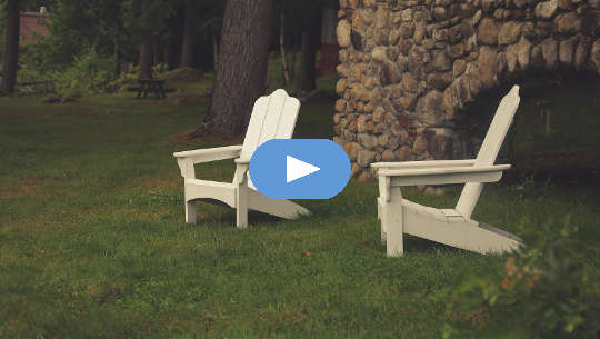 Turning From Doing To Being two empty lawn chairs in from of a rock wall