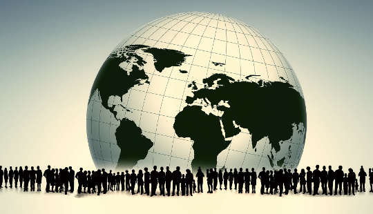 How to Let Go of War Narratives and Prioritize Collective Well-Being many people surrounding a black and white globe of planet earth