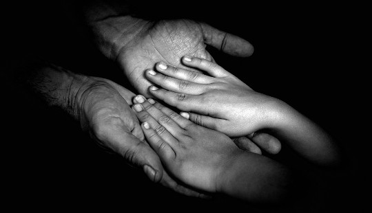 5 Practices to Activate, Nourish and Fortify Your Innate Connection System adult hands and child hands, palm to palm