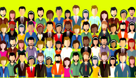 group of multi-racial individuals standing for a group photo