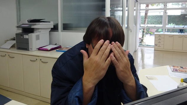 How to Attain Freedom from Hidden Shame man hiding his face in his hands