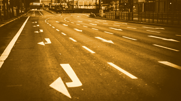 Lose Your Story, Lose the Past a road with many lanes going straight ahead, and one lane making a sharp right turn