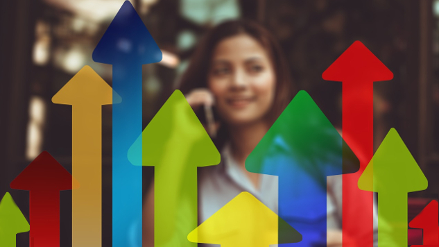10 Steps to Create Positive Karma and a Successful Life woman standing behind a row of colorful graphical arrows pointing up