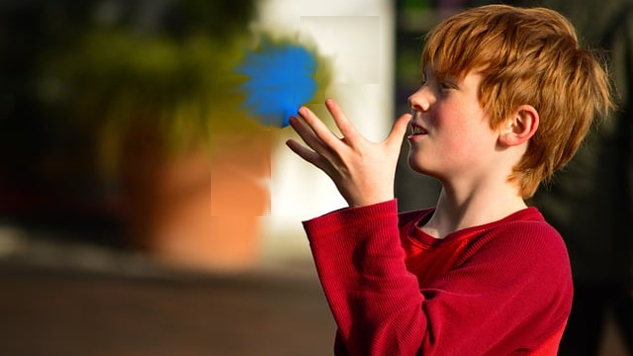 Your Natural Psychic Abilities a young boy with open hands