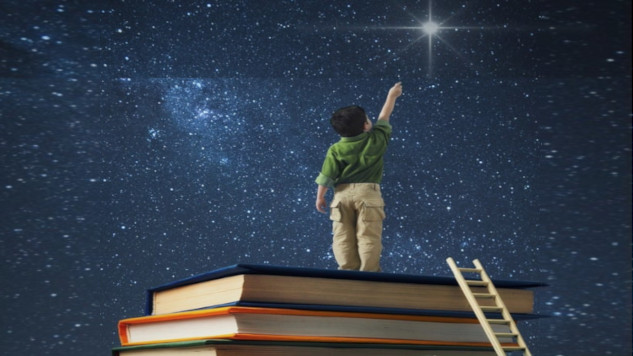 As We Face the Next Few Years, Hold Fast to Ethics a young boy standing on a stack of books reaching for the North Star