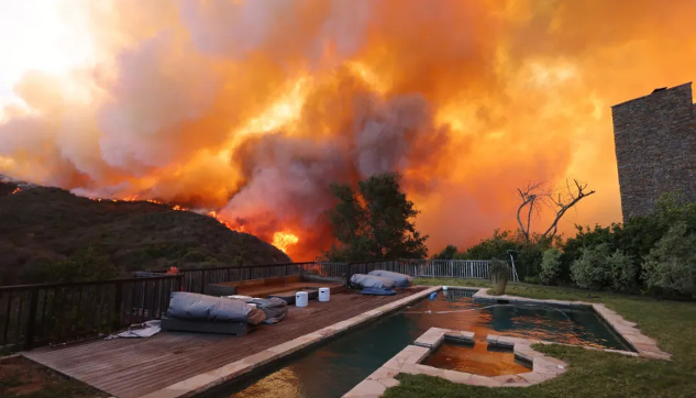 Which strategies can help prevent human-caused wildfires? What impact does climate change have on wildfire intensity?