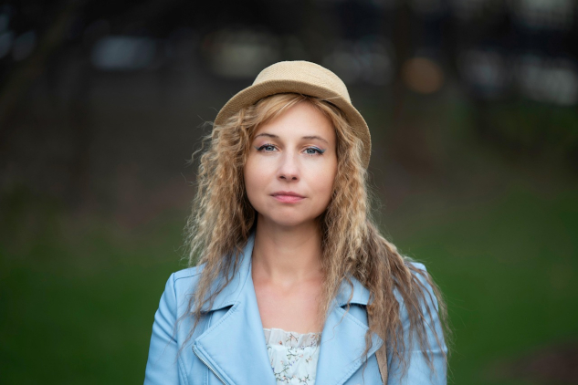 Redefining Femininity: The Future of Feminine Empowerment woman wearing a hat