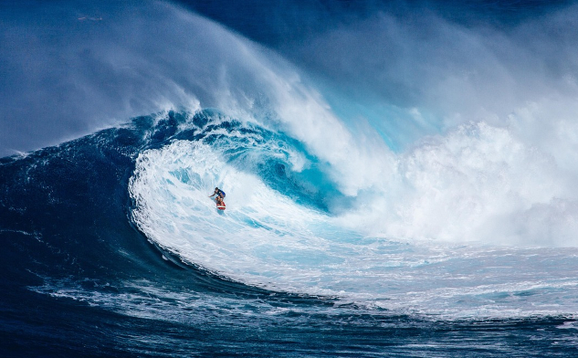 Beyond Good and Bad: Finding Peace in a World of Extremes A surfer in the middle of a huge wave. Image by Pexels from Pixabay.